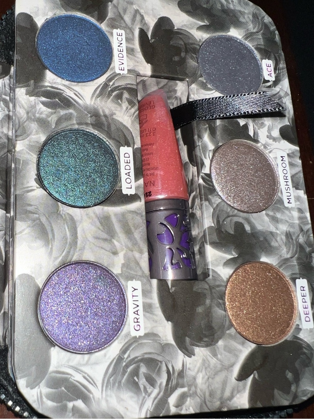Urban Decay Dangerous Eyeshadow Palette with Purple, Blue, Teal and Bronze Shade